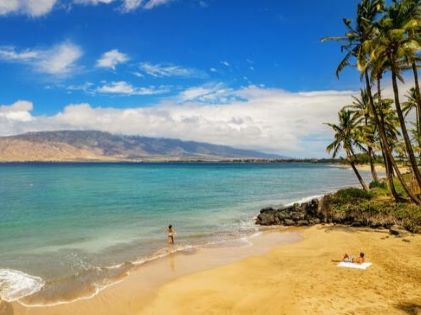 A couple on the beach on Maui, Hawaii