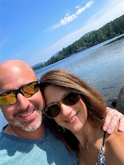 A Hilton Grand Vacations Member and her partner at Lake Placid, New York