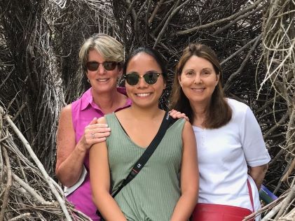 Two Hilton Grand Vacations Members on a getaway with family