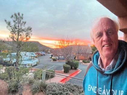 A Hilton Grand Vacations Member on a balcony at Sedona Summit, a Hilton Vacation Club in Arizona