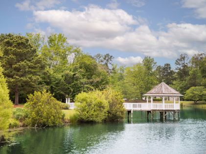 A pond and gazebo at The Historic Powhatan, a Hilton Vacation Club in Williamsburg, Virginia