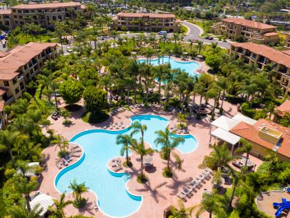 Aerial image, beautiful resort, palm tree-lined pools,  MarBrisa, a Hilton Grand Vacations Club, San Diego, California.