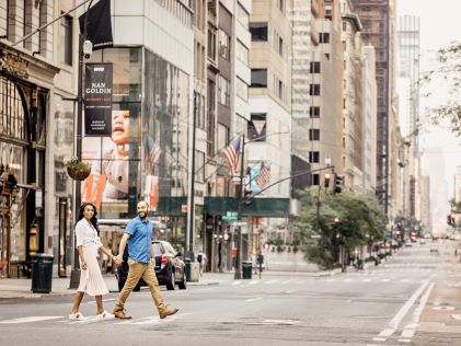 A couple holds hands in New York City