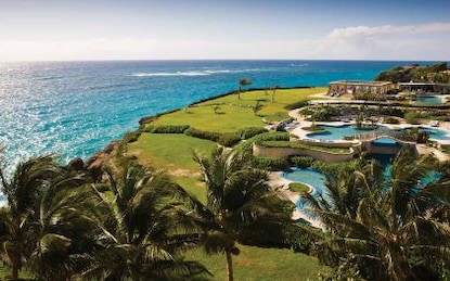 Stunning aerial view of The Crane, a Hilton Grand Vacations Club perched atop a coastal cliff, Barbados.