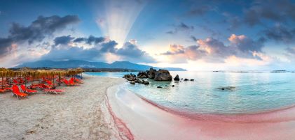 Iconic pink sand and crashing waves, Elafonissi Beach,  Crete, Greece.