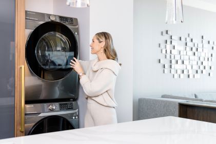HGV Member enjoying in Suite washer/dryer, Elara, a Hilton Grand Vacations, Las Vegas, Nevada. 