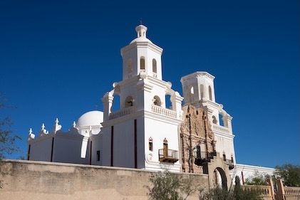 Sunlit white walls of San Xavier del Bac Mission in Tucson, Arizona
