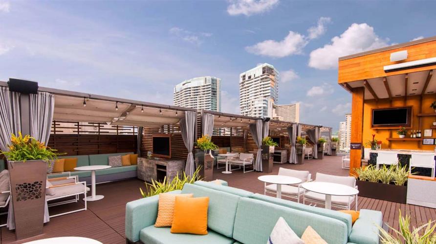 Our Favorite Honolulu Hidden Gem The Hokulani Waikiki Rooftop Bar