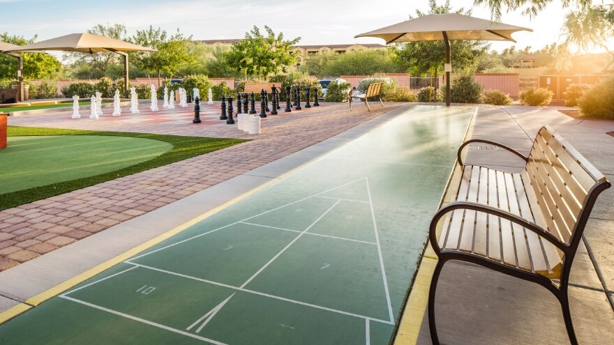 Courtyard with shuffleboard at Scottsdale Villa Mirage, a Hilton Vacation Club located in Scottsdale, Arizona.