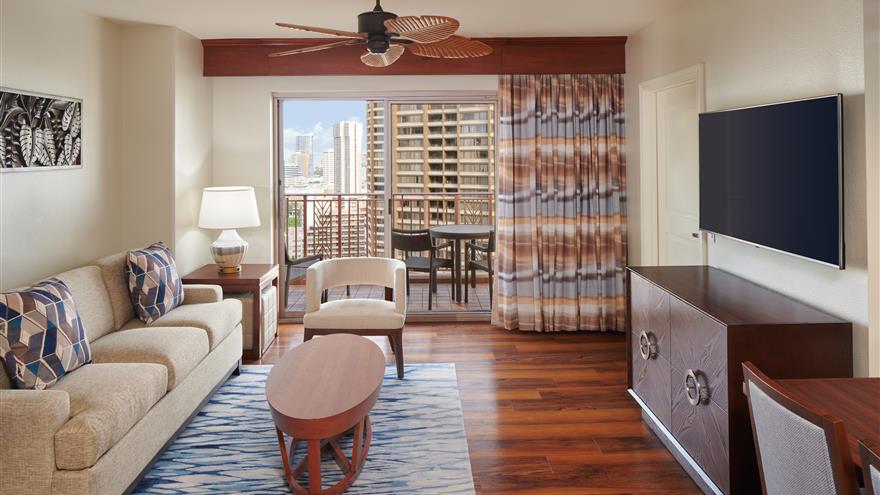 Living area at Grand Waikikian, a Hilton Grand Vacations Club located at Waikiki Beach, Oahu, Hawaii.