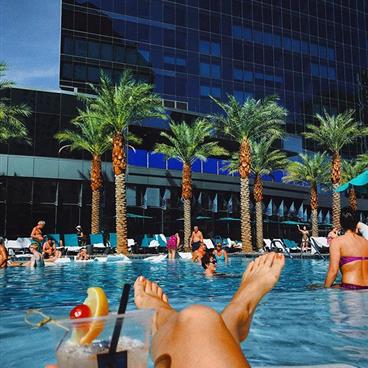 Lounging poolside at Elara located in Las Vegas, Nevada.