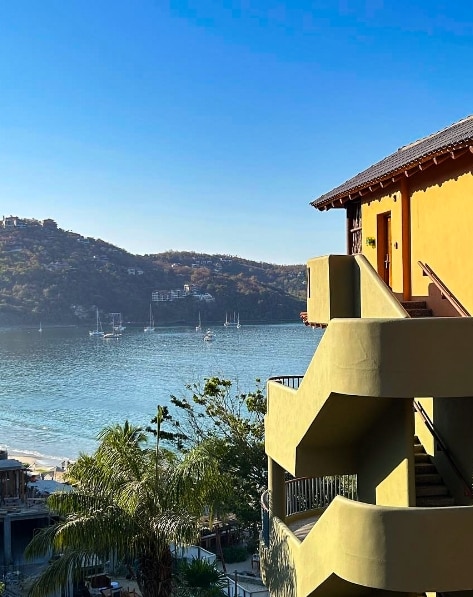Stairs coming down from Hilton Grand Vacations Club Zihuatanejo towards the water.