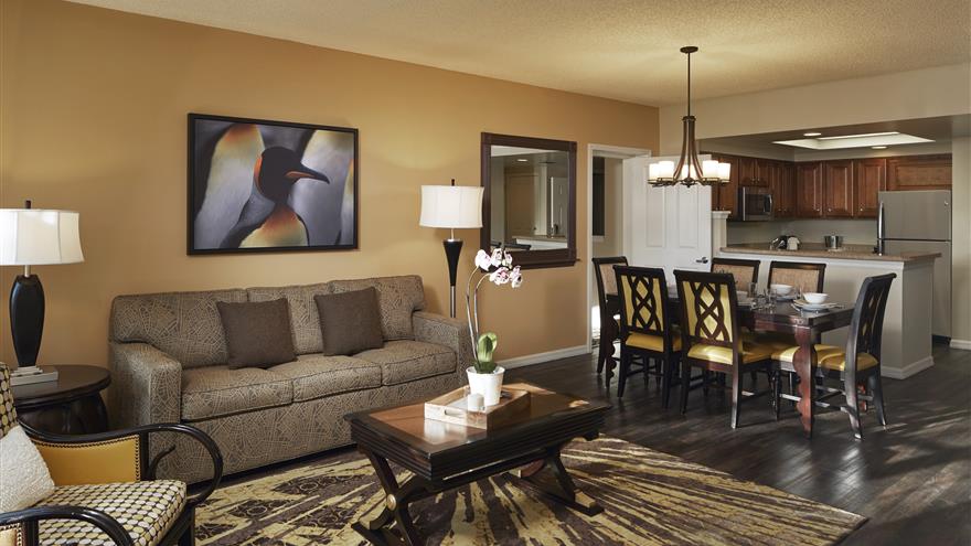 Living and dining room at SeaWorld® Orlando, a Hilton Grand Vacations Club located in Orlando, Florida.