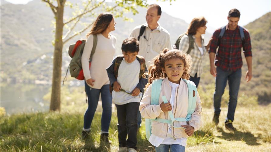 Multi-generational family hiking in Park City, Utah.