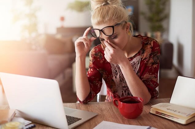 Women with glasses stressed