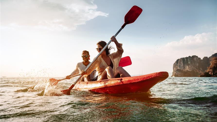 GettyImages-1134157962 couple on a canoe